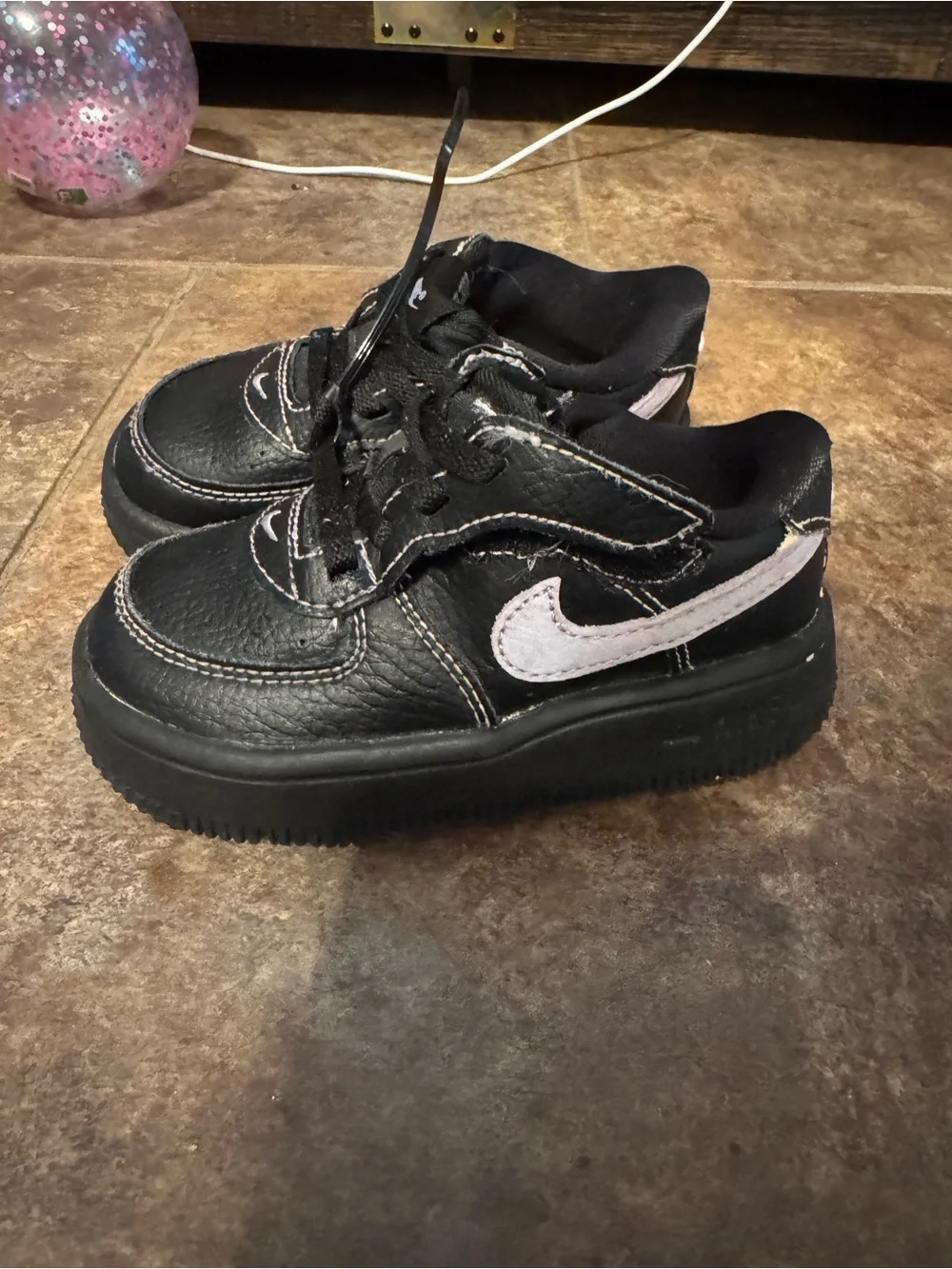 Nike Kids Black Sneakers with Light Pink Swoosh